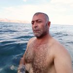 hairy chest gods faces of masculinity naked swimming wolf