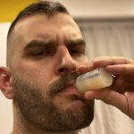 a bloke drinking semen