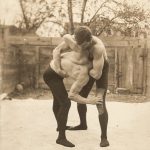 vintage ‘Two men wrestling in a courtyard.’ 1910s