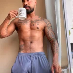 sexy bloke freeballing bulge coffee